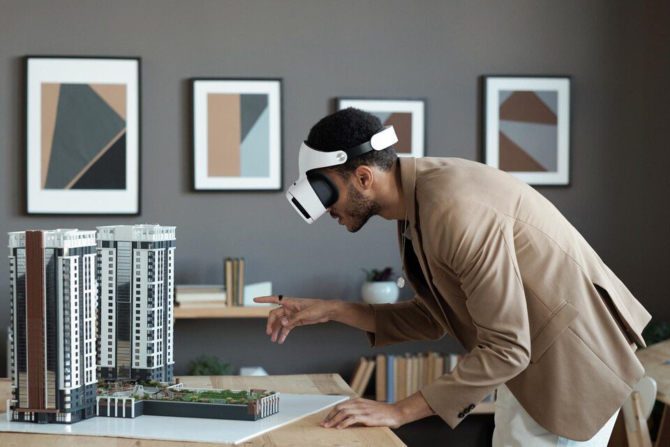 Real estate professional using VR to visualize property designs